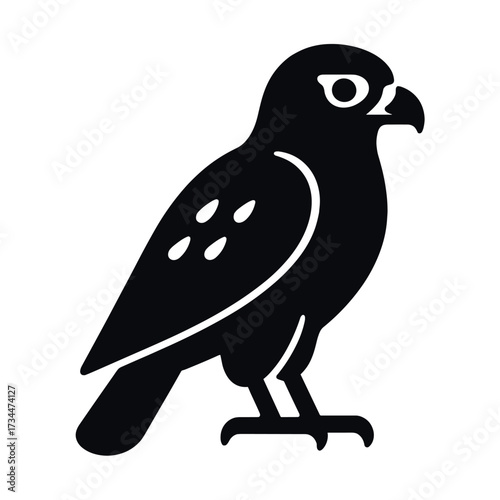 Silhouette of a falcon with distinctive spots and sharp beak