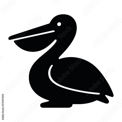 Silhouette of a pelican standing gracefully
