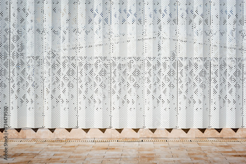 White metallic vertical material. Fence wall background.
