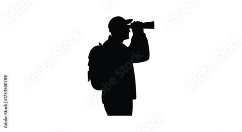 A photographer with a camera and backpack a striking silhouette