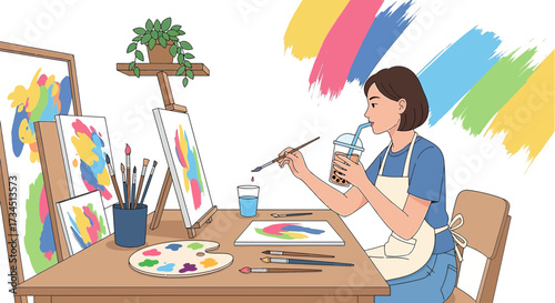 Young artist painting with boba tea enjoying her creative hobby at the studio or at home in a