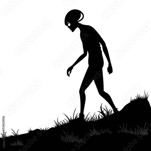 Silhouette of an alien walking on a grassy hill against a white background