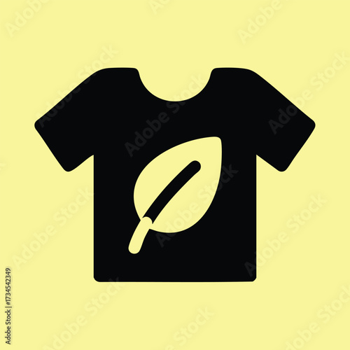 Black T-shirt with a Leaf and Quill Design on a Light Yellow