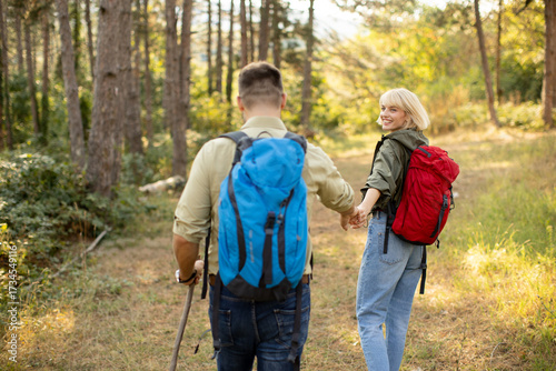 Young couple enjoys a hikin...