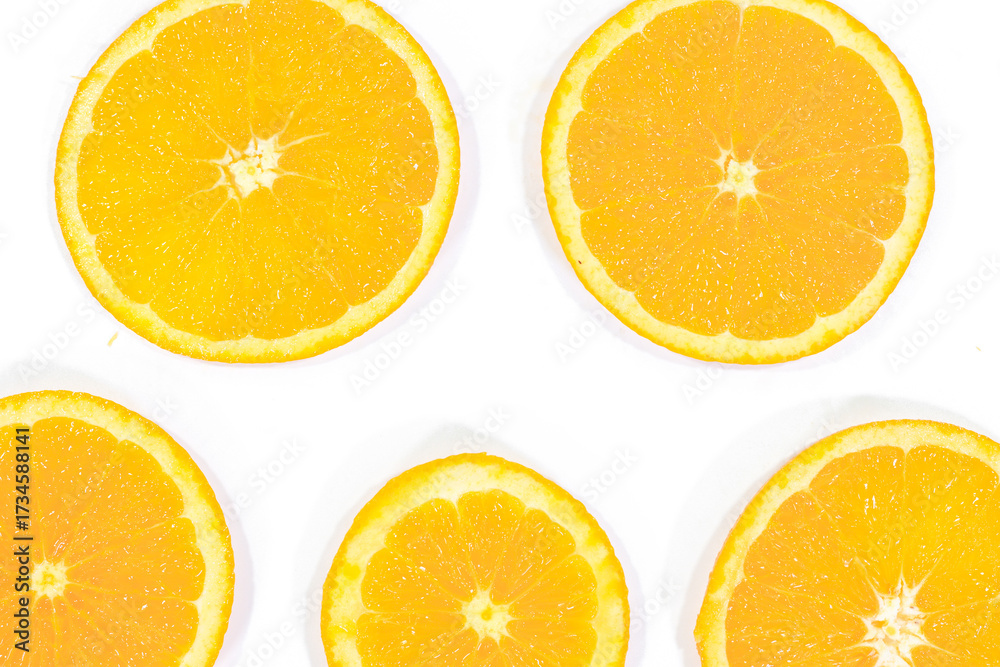 Fototapeta premium Sliced Valencia Oranges on a White Background