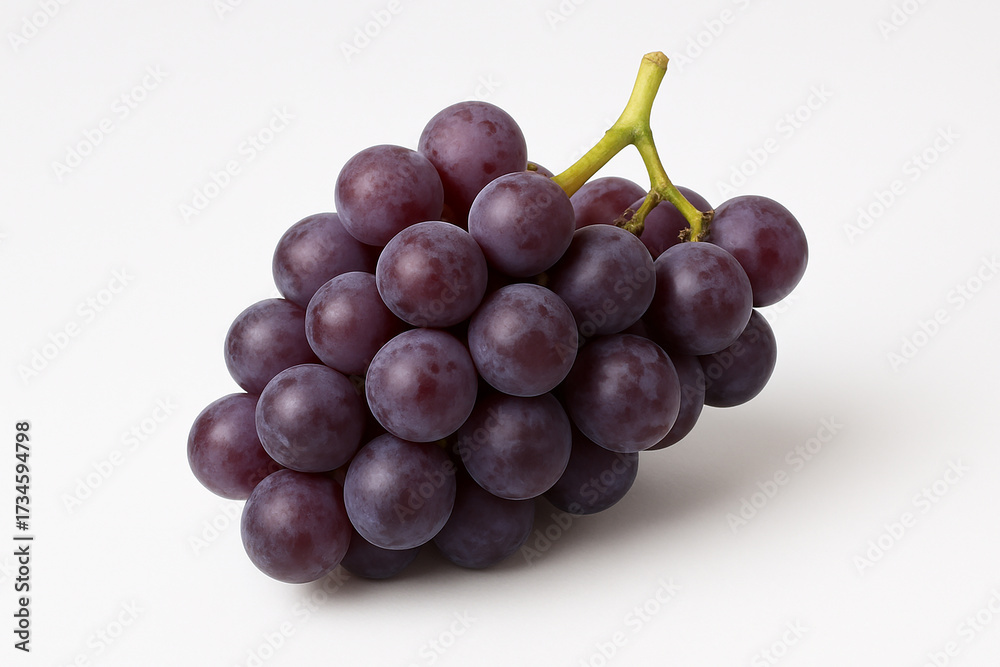 Fototapeta premium Fresh bunch of dark purple grapes on a white background