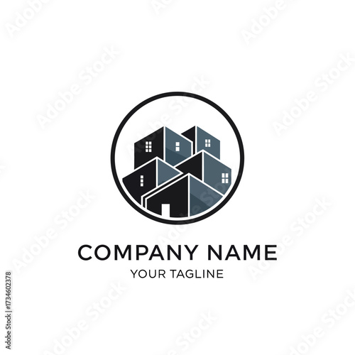 A modern real estate logo design featuring stylized buildings inside a circle with placeholder text for company name and tagline.