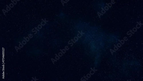 An infinite starfield moving in parallax with shining distant galaxies and realistic floating space dust. A dreamy and surreal cinematic HDR 4K space scene. Created with generative AI.