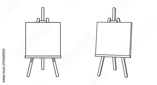 Two empty wooden easels stand side by side awaiting artistic expression