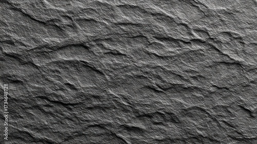 Textured gray slate stone surface with rough edges and natural patterns