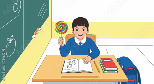 Happy schoolboy with a lollipop at his desk in the classroom is enjoying break time or after