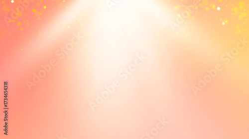 Soft glowing light beam illuminating a warm orange and yellow gradient background with subtle bokeh