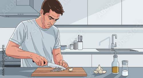 Man chopping garlic on a wooden board in a modern kitchen preparing a healthy meal for dinner in a