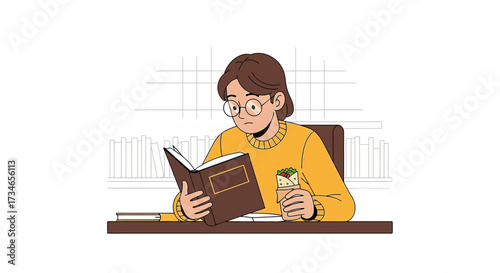 Student engrossed in a book at desk, juggling reading and a tasty wrap for a break