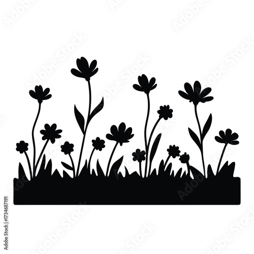 Black and white silhouette of flowers growing in a grassy field design