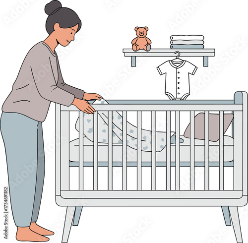 Woman arranging a white baby crib with baby clothes and toys on a shelf