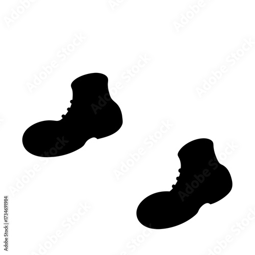 Stylized silhouette image showcasing two clown or cartoon like shoes