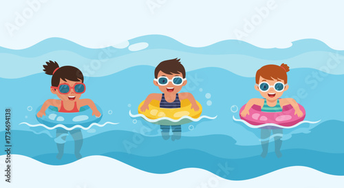 Three children swimming with inflatable rings in blue water