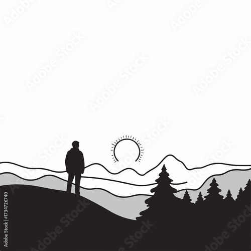 Silhouette of a man standing on a hilltop during sunrise  
