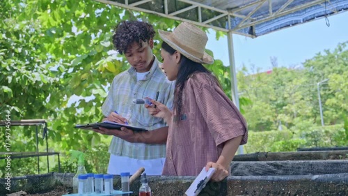 STEM students collaborating on an agricultural research project. Young people learning about soil science and technology. Education and sustainable farming with technology.
