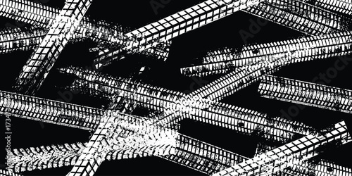 Tire track seamless pattern. Grange tread marks .Grunge textured vector car tread . Car trails endless pattern texture. Tyre track seamless texture. Wheel tire tread track background
