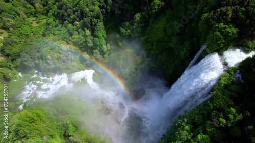 Waterfall scenery with rainbow . Cascate delle Marmore - biggest artificial waterfall in Europe. Umbria, Italy. aerial drone 4k hd video
