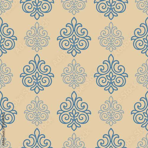 A pattern of blue and white flowers is embroidered on a tan background. The flowers are arranged in a way that creates a sense of movement and flow. Scene is serene and calming