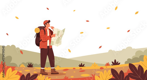 Adventurous hiker exploring a map during a beautiful autumn hike in the mountains
