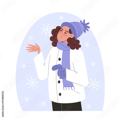 Person in winter attire with snowflakes