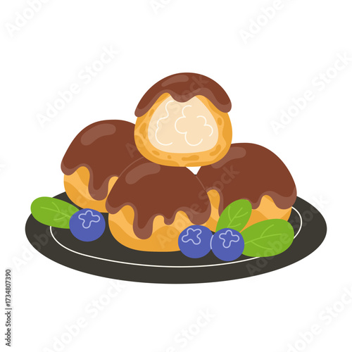 Plate of chocolatecovered cream puffs with blueberries