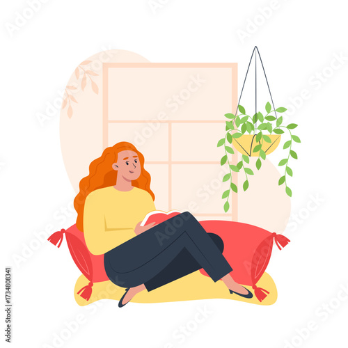 Relaxing at the window with a book