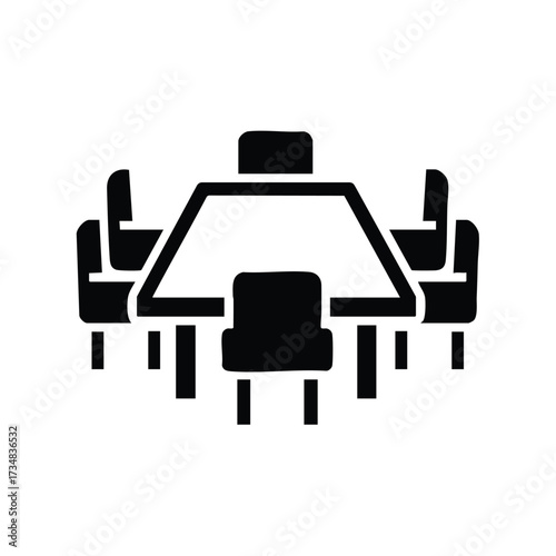 Modern conference room with a large rectangular table surrounded by comfortable chairs for meetings and discussions