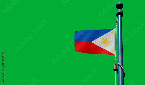 Obraz na płótnie Philippines flag silhouetted against a warm sunset sky creating an emotive scene