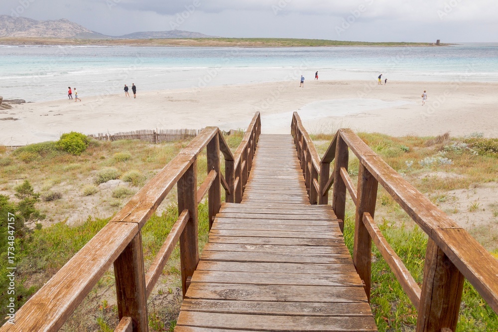 Fototapeta premium wooden bridge on the beach in Sardinia