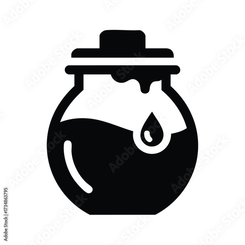 Small round jar with a lid and a drop of liquid on its , used for storing preserves or condiments in kitchens or pantries