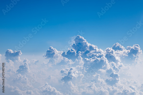 White Clouds and Blue Sky. Sky and Clouds Aerial Photography. Cloudscape View from Airplane Window.