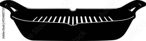 Black silhouette of a grill pan with raised ridges for cooking food isolated on white background

