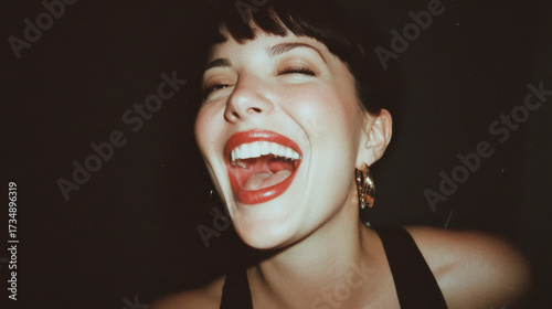 Vintage Style Candid Portrait of a Laughing Woman with Flash Photography