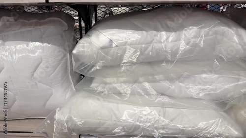 new white pillows for sale on a store shelf