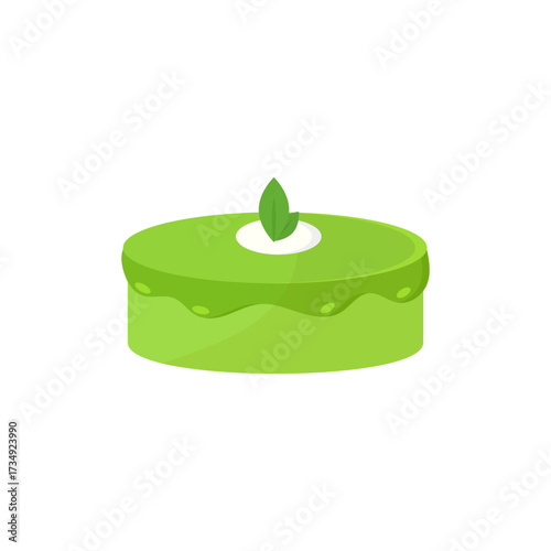 Delightful green cake with a fresh mint leaf and creamy topping, perfect for celebrations or a sweet treat
