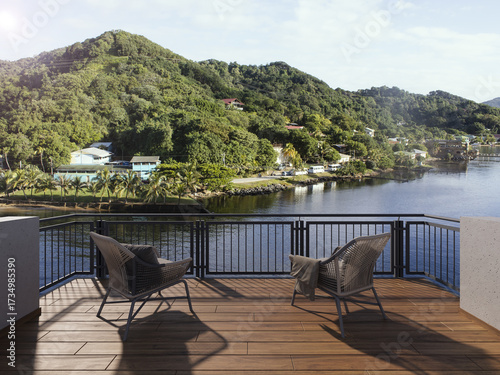 View from the balcony to the sea and mountain.Landscape. Sunny Day. Terrace with a cozy chairs and a beautiful view. Background with beautiful landscape. City near the sea.