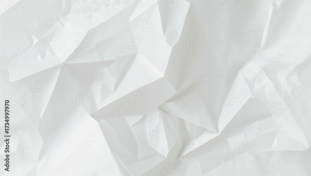 Obraz premium Delicate white tissue paper background with soft wrinkles and semi-transparent layers. Light, airy paper texture for modern design and presentation.
