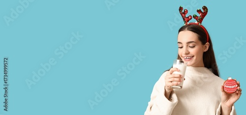 Young woman with tasty Chri...