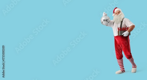 Santa Claus holding radio r...