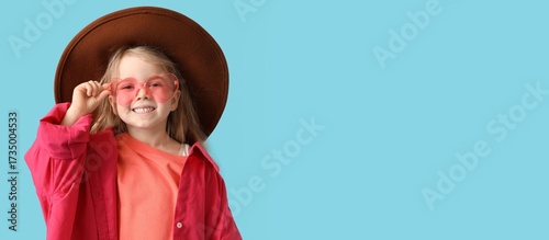 Cute little girl in oversiz...