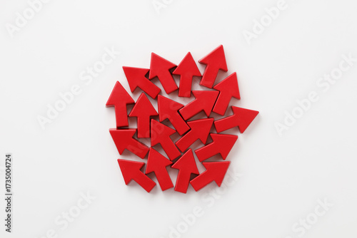 red arrow-shaped objects on a white background