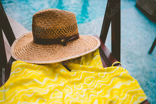 hat by the pool