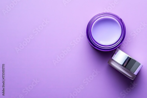 Two open cream jars against a violet flat backdrop