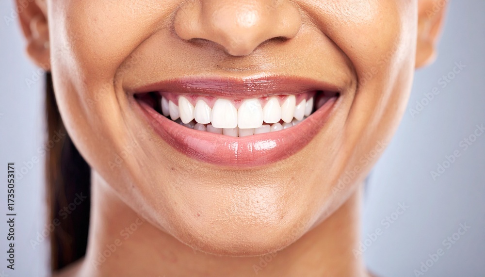 Obraz premium Portrait, closeup and woman with mockup, white teeth and smile against a studio background. Face, female person and girl with happiness, oral hygiene and dental care with wellness, zoom and health