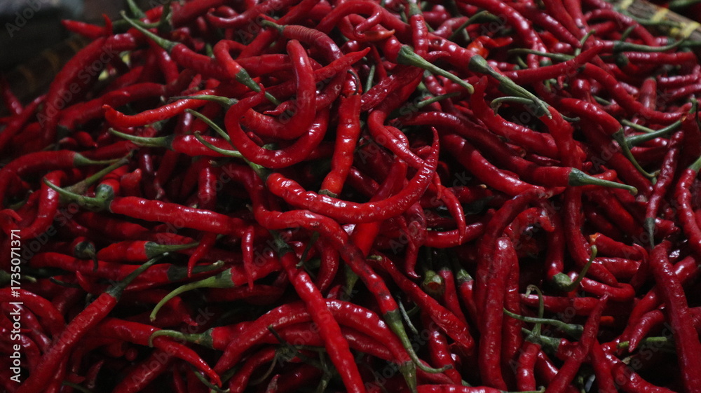 Fototapeta premium piles of red chili cayenne seller of Indonesian traditional markets 